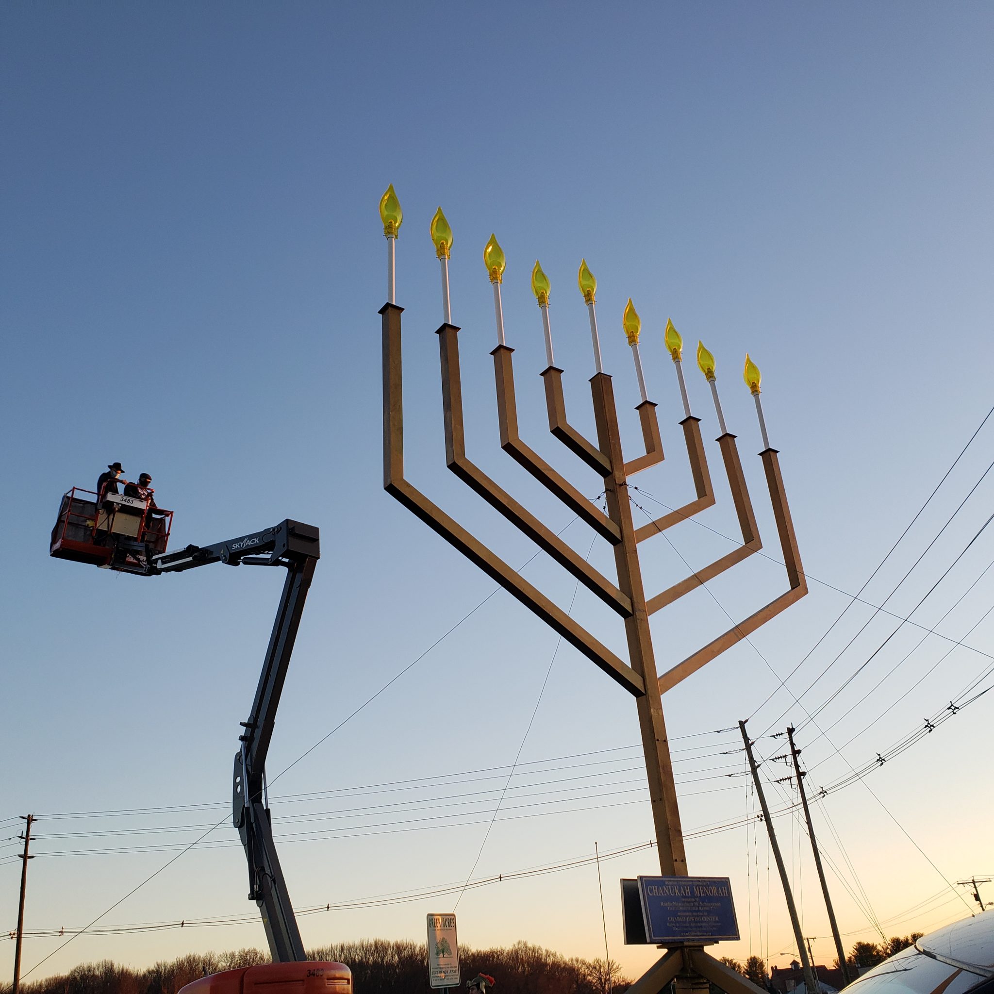 Chabad of Monroe spreads light during Hanukkah season, pays tribute to essential workers