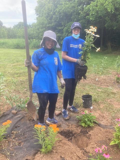 Scouts participate in beautifying North Brunswick butterfly garden