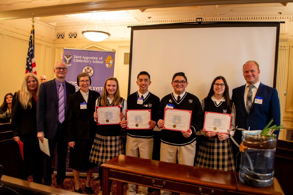 St. Augustine students present hydroponic system during Catholic Schools Week