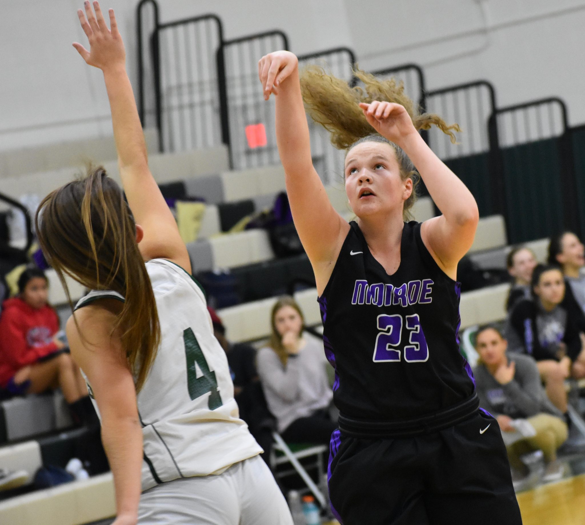 Monroe races by East Brunswick on girls’ basketball court