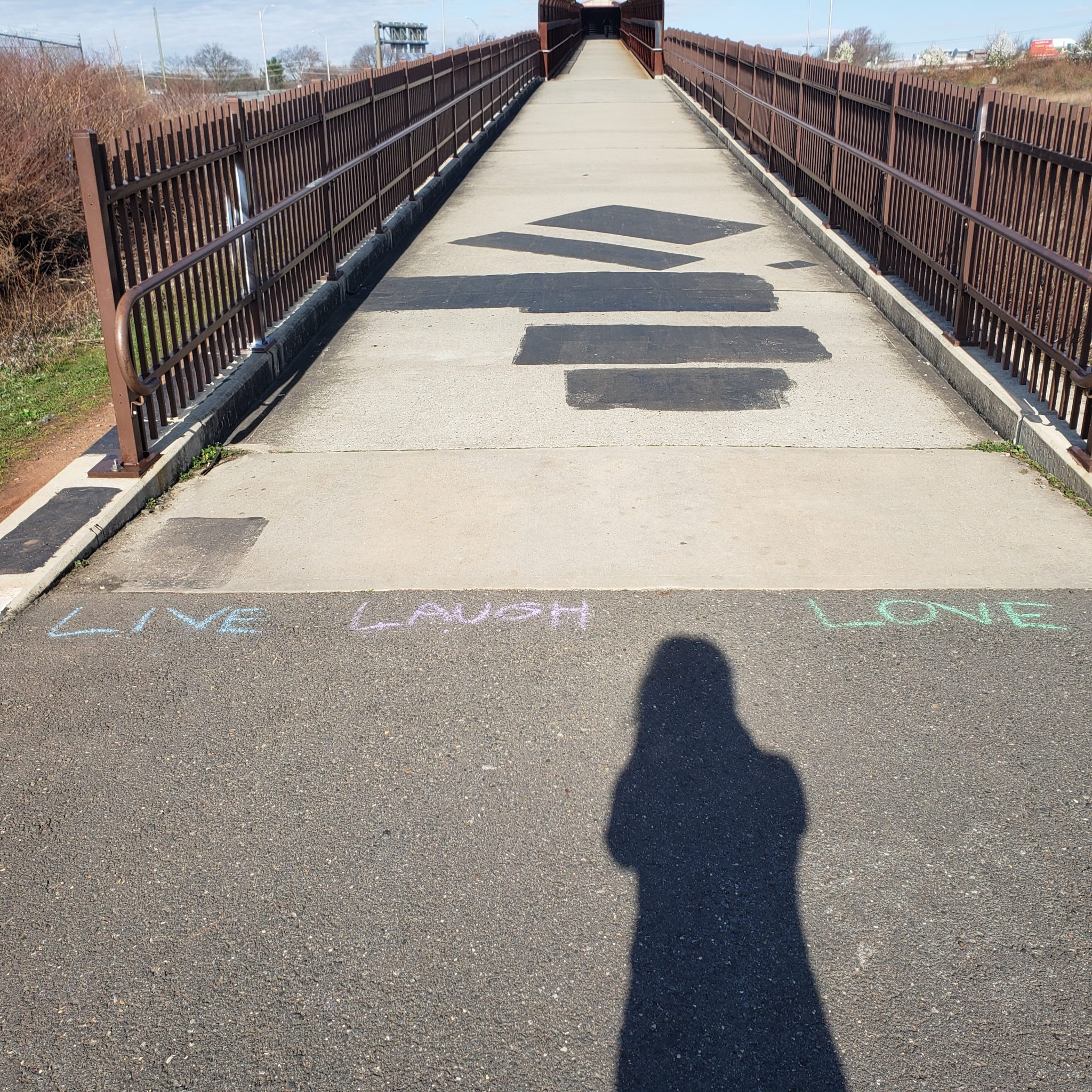 Uplifting colorful words offer encouragement on Middlesex Greenway during pandemic