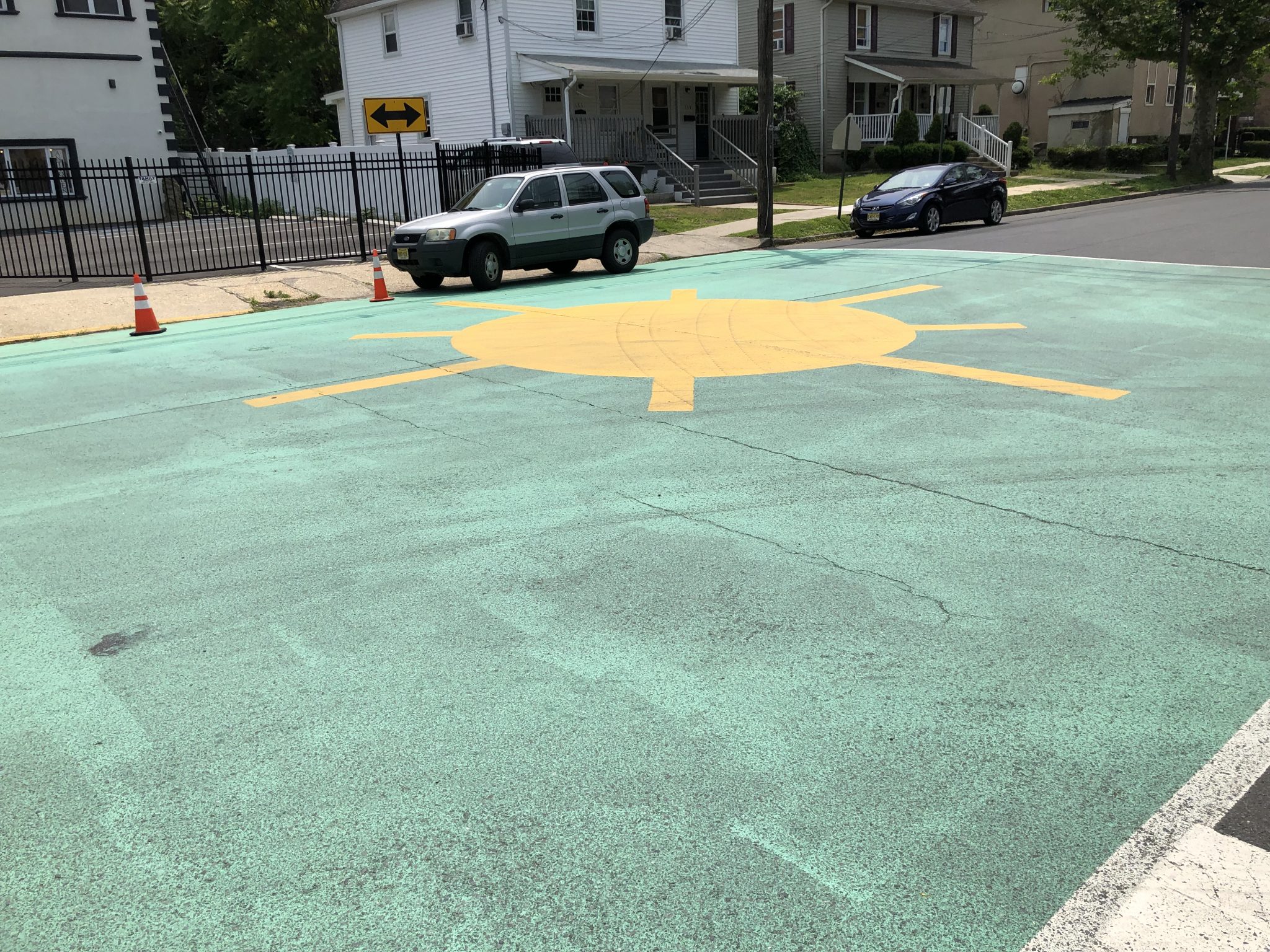 Road mural created as traffic calming device at Red Bank intersection