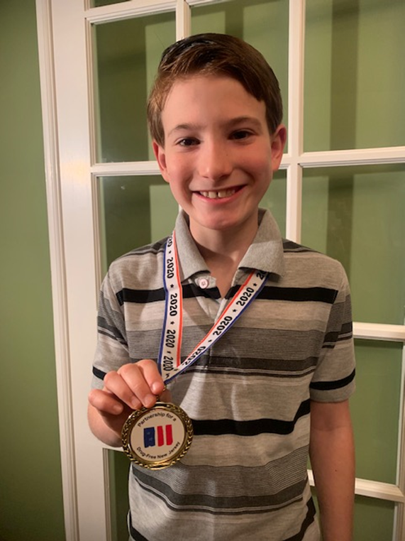 Lawrence fourth grader is one of two state winners of anti-drug folder contest