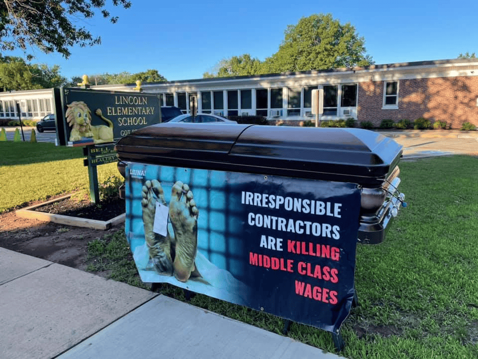 Labor union will review its use of coffin to display message after incident at Lincoln Elementary School