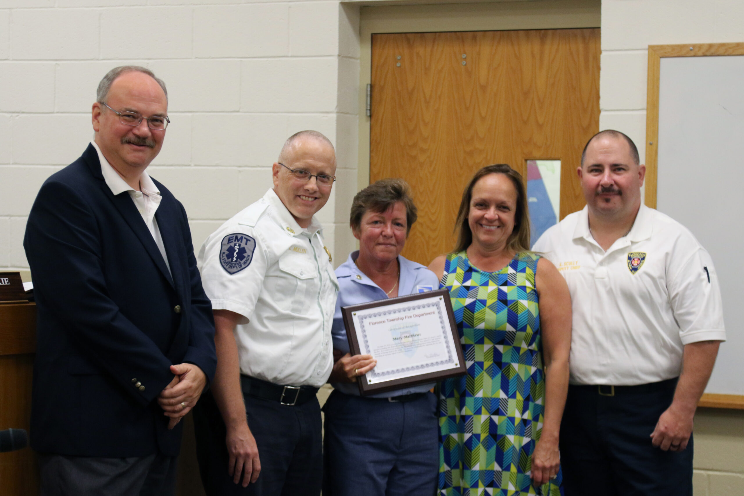 Florence mail carrier honored at council meeting