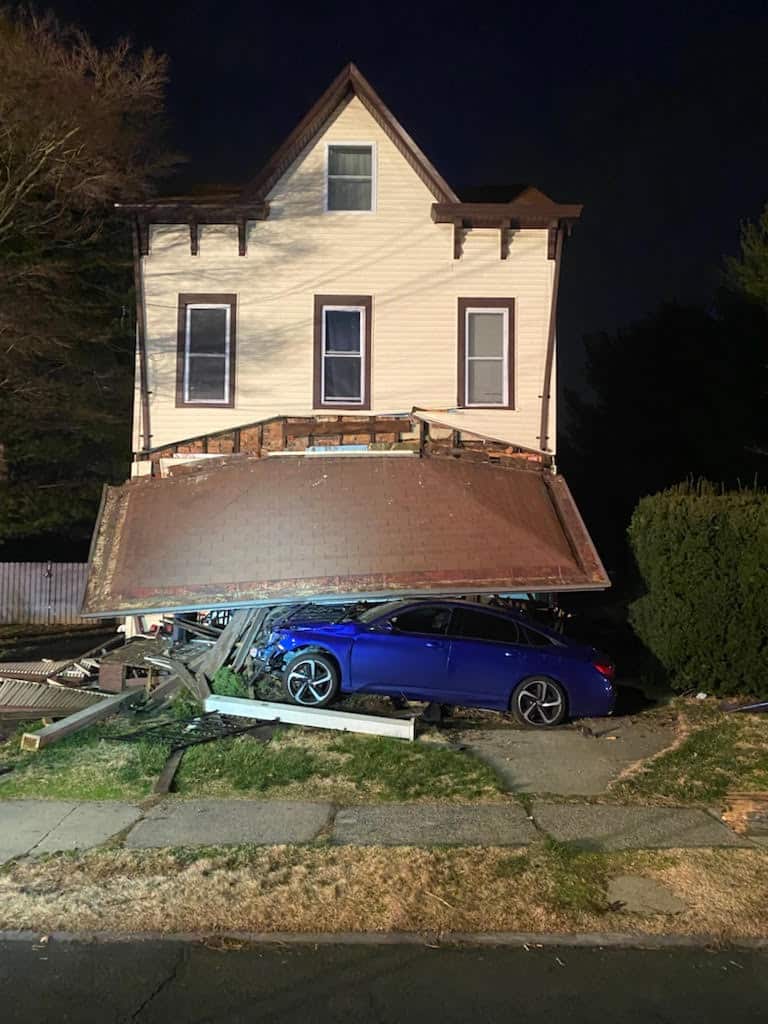 New Brunswick man charged with DWI after car strikes pole, porch in Milltown; driver suffers minor injuries, no one in residence hurt