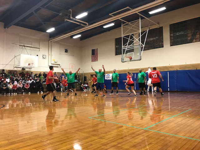 Florence school district and local police raise money for families with charity basketball game