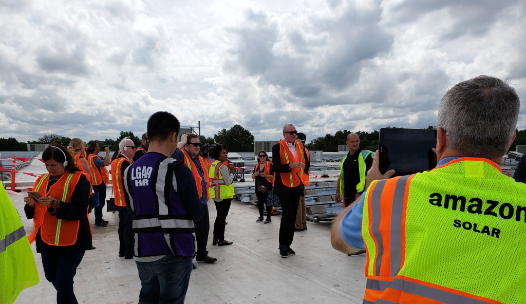 Gov. Phil Murphy helps celebrate innovative solar rooftop panel installation at Edison Amazon facility