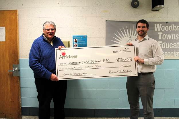 Applebee’s of Woodbridge makes donation to Matthew Jago School for boundless playground