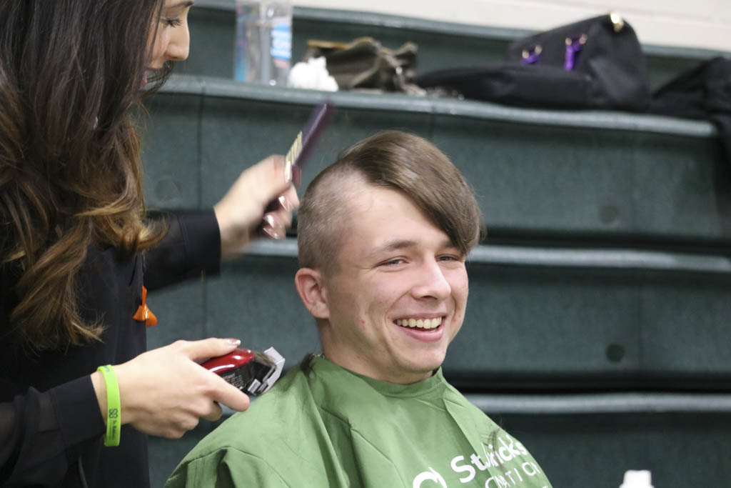 ‘Shavees’ raise money for pediatric cancer research by cutting all their hair