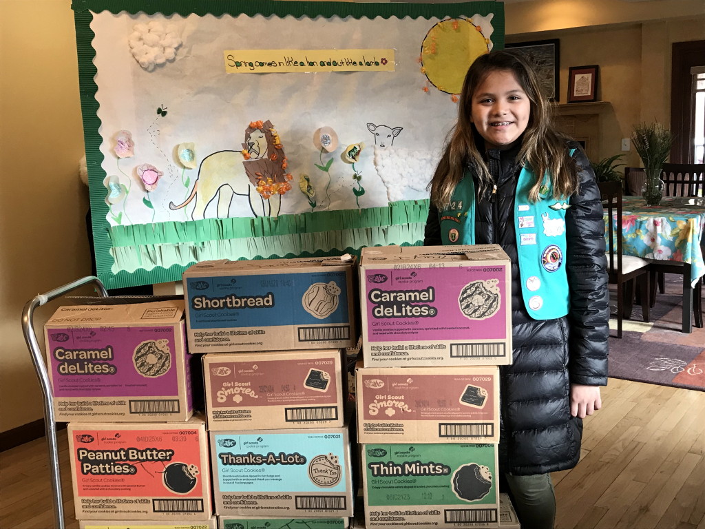 St. Francis fifth-grader helps people in need using Girl Scout cookies