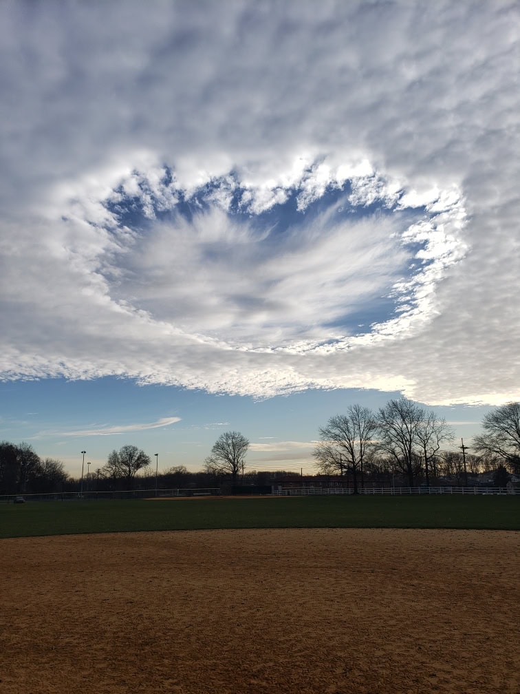 ‘Fallstreak’ cloud formation captured above Warren Park in Woodbridge