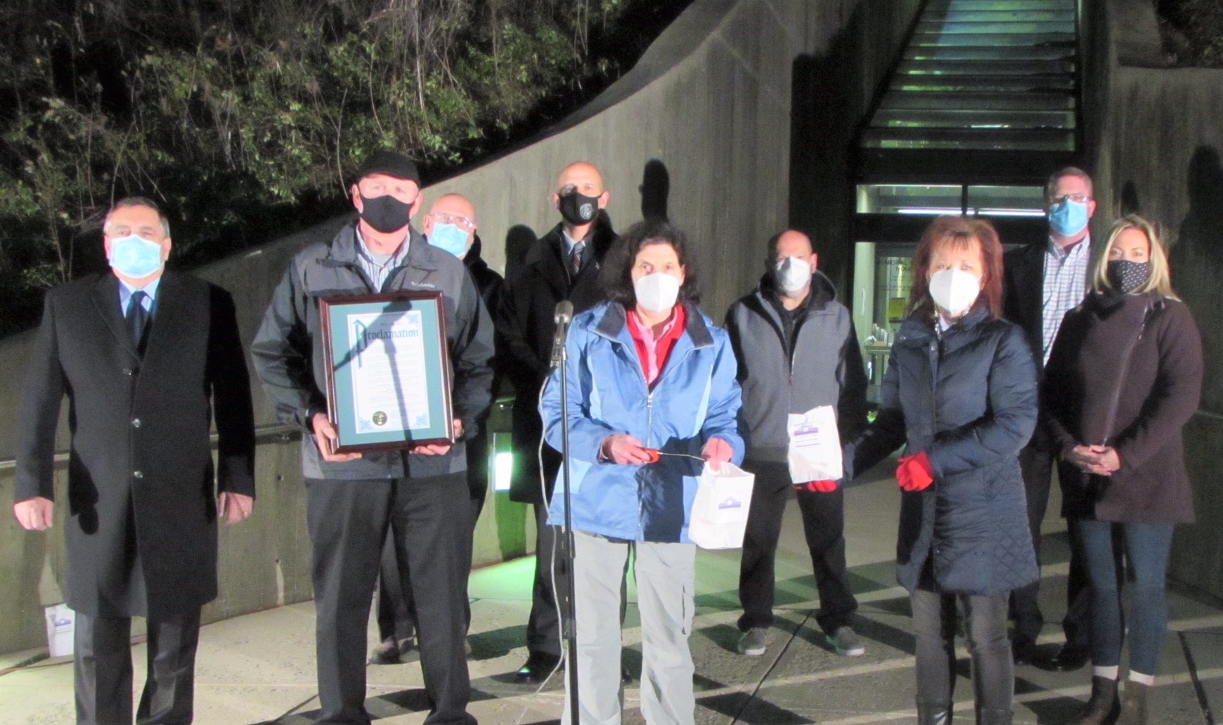 East Windsor Municipal Building lit with candles to bring awareness to domestic violence