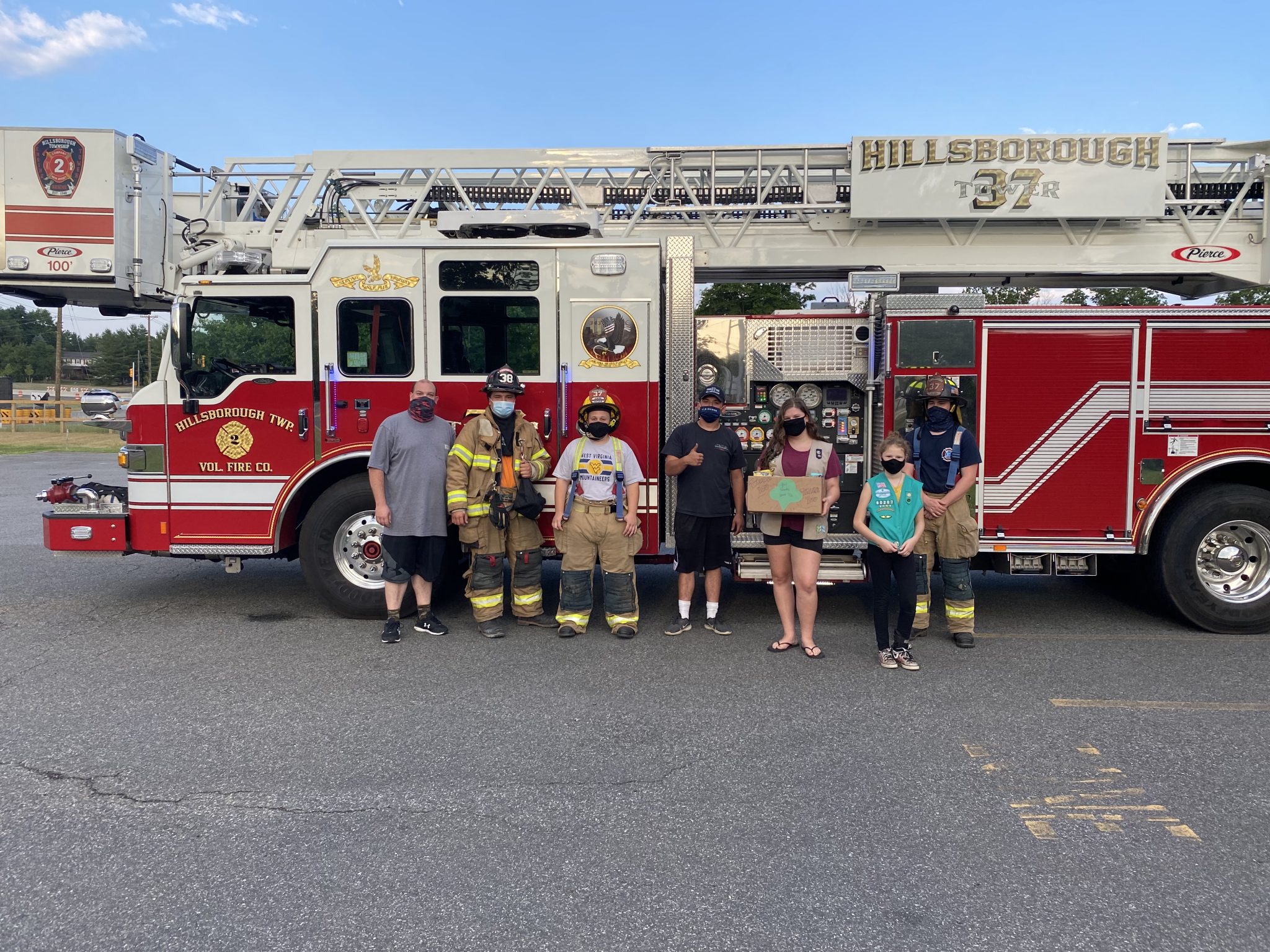 Hillsborough Fire Co. No. 2 members help Girl Scouts prepare for cookie delivery