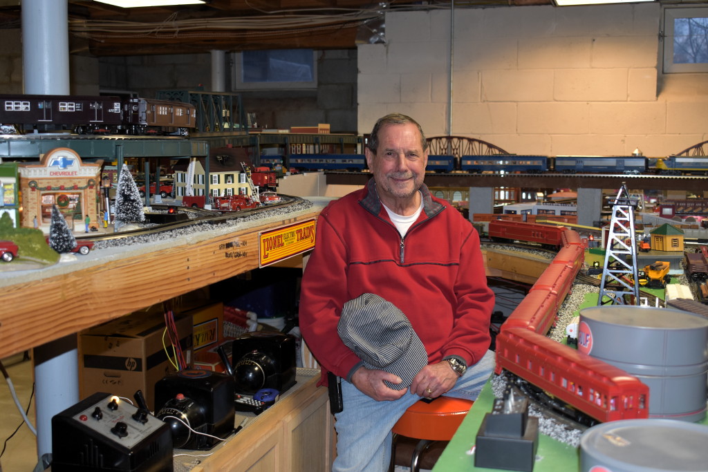 Train enthusiast travels through time with railroad set