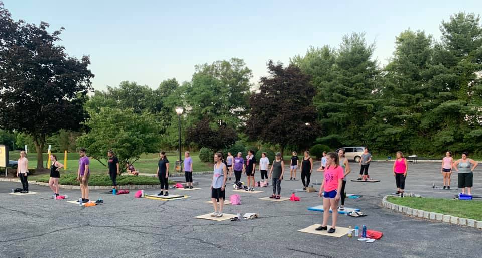 Kathleen Academy of Dance holds tap dancing classes in parking lot