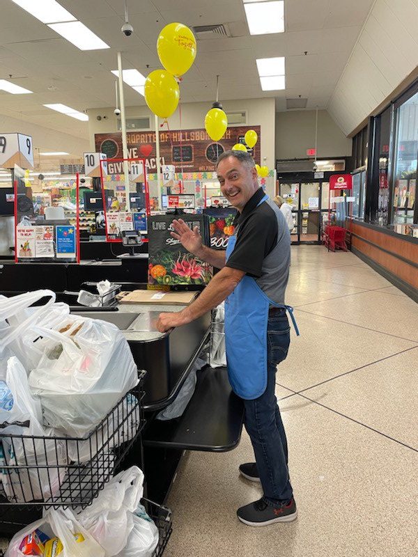 Hillsborough officials bag groceries to bring attention to the issue of hunger in the community