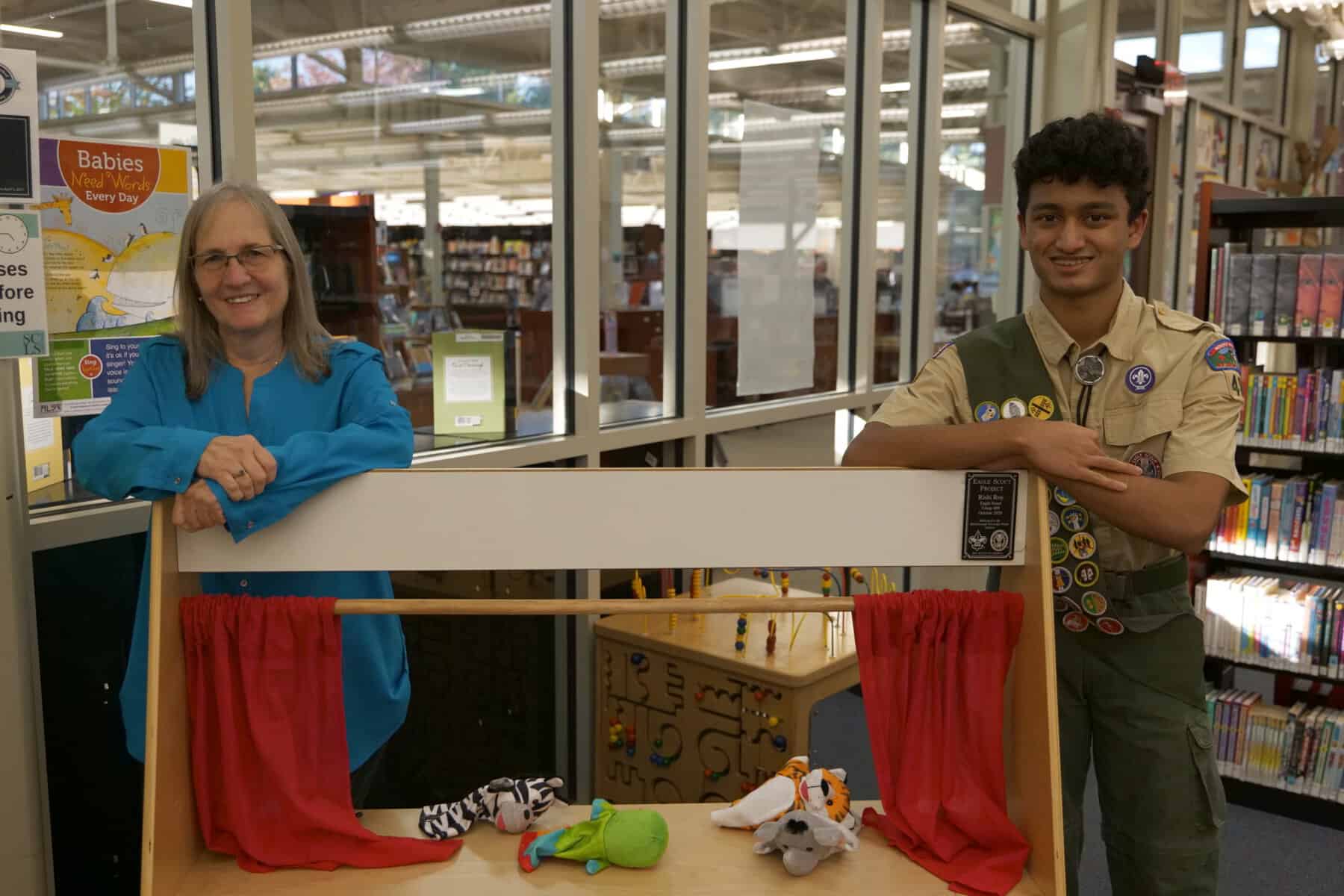 Hillsborough Eagle Scout crafts puppet theater for library