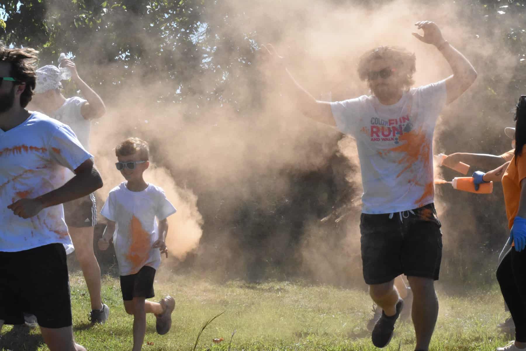 Color Fun Run covers community residents, families in an array of colors