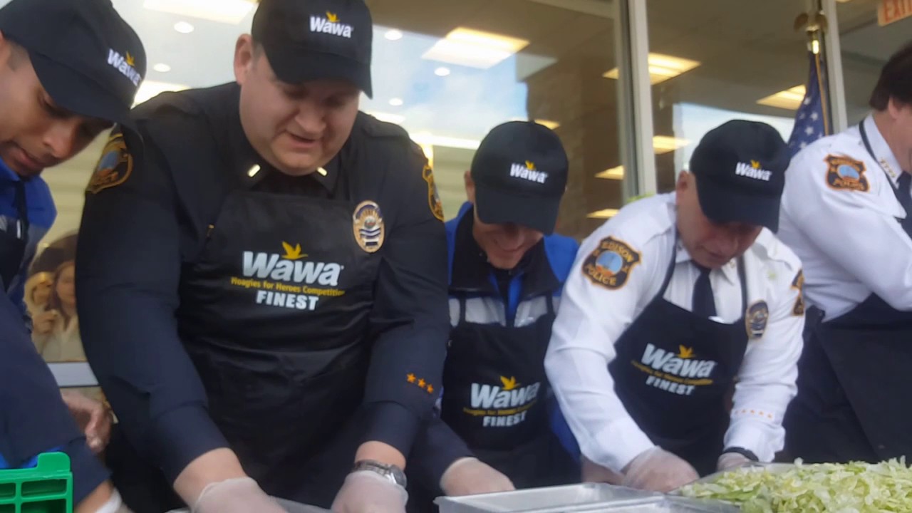 Police and fire battle for bragging rights at Wawa opening