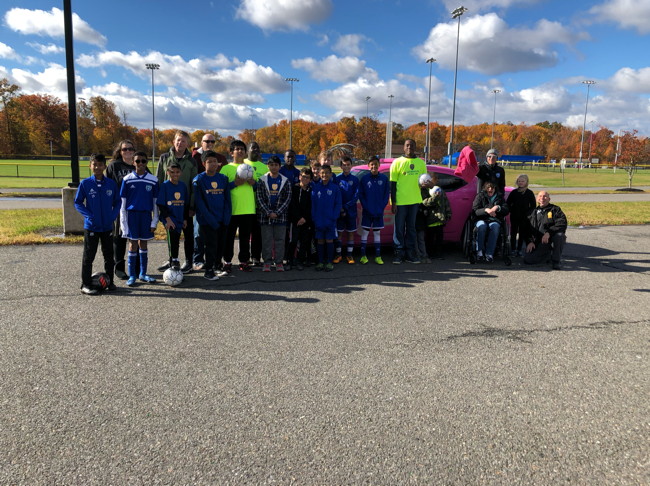 North Brunswick Buddy Ball players practice drills, see new pink patrol car