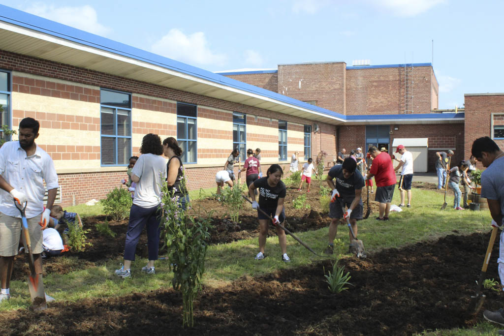 Church members, Linwood staff improve courtyard at middle school