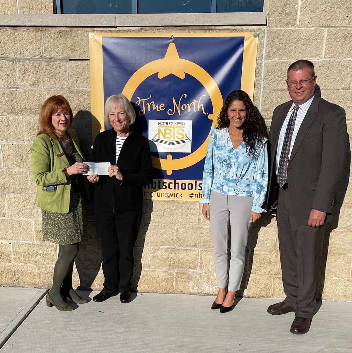 North Brunswick Township Schools make donation to replenish food bank