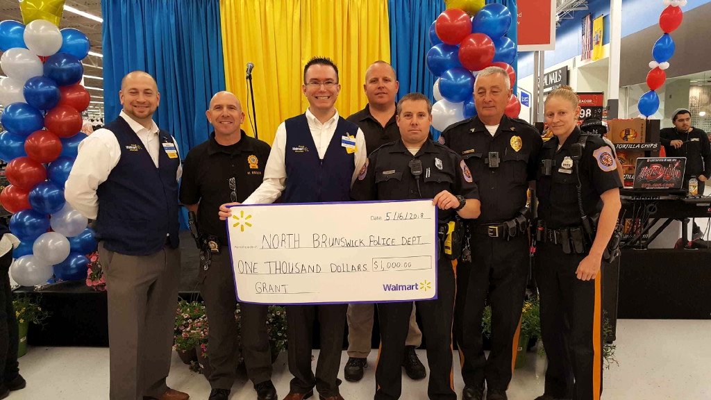 Walmart presents North Brunswick Police Department with $1,000 check