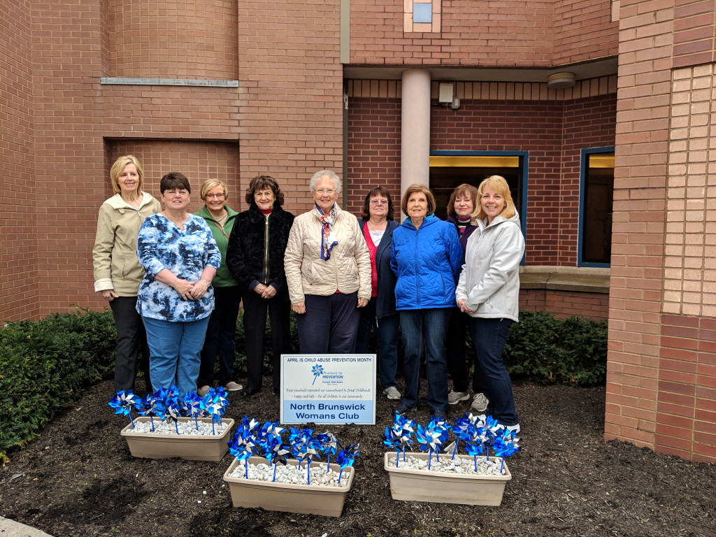 North Brunswick Woman’s Club members ‘plant’ pinwheels in honor of Prevent Child Abuse Month