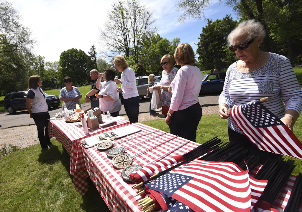 Replace flags at Elmwood Cemetery before Memorial Day