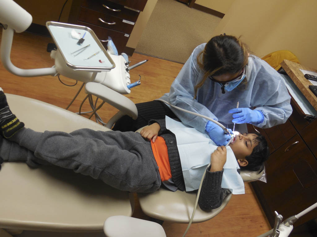 Dentists leave children smiling after dental exams