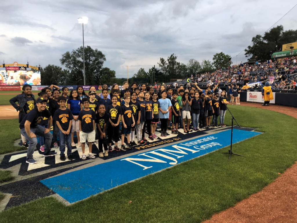 South Brunswick students sing the National Anthem at a Trenton Thunder ballgame