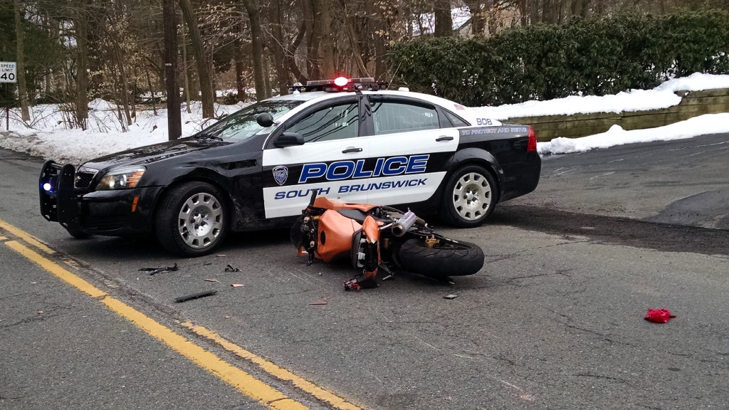 Motorcycle rider allegedly eludes officer, then crashes into patrol car