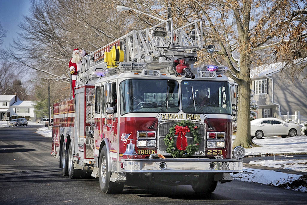 Kendall Park firefighters brings Santa to Brunswick Acres