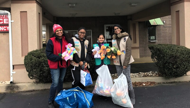 South Brunswick Girl Scouts bring cheer on Christmas Day