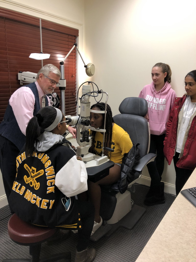 South Brunswick Girl Scouts earn vision awareness badges at office of Dr. Niemczyk