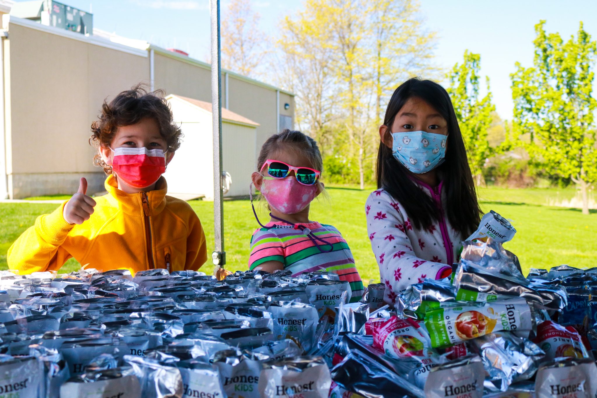 Children from Princeton Montessori help assemble meals for TASK