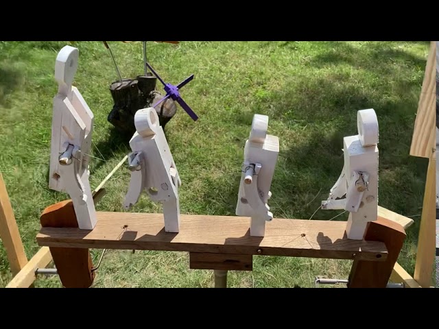 Kendall Park backyard decorated with kinetic sculptures