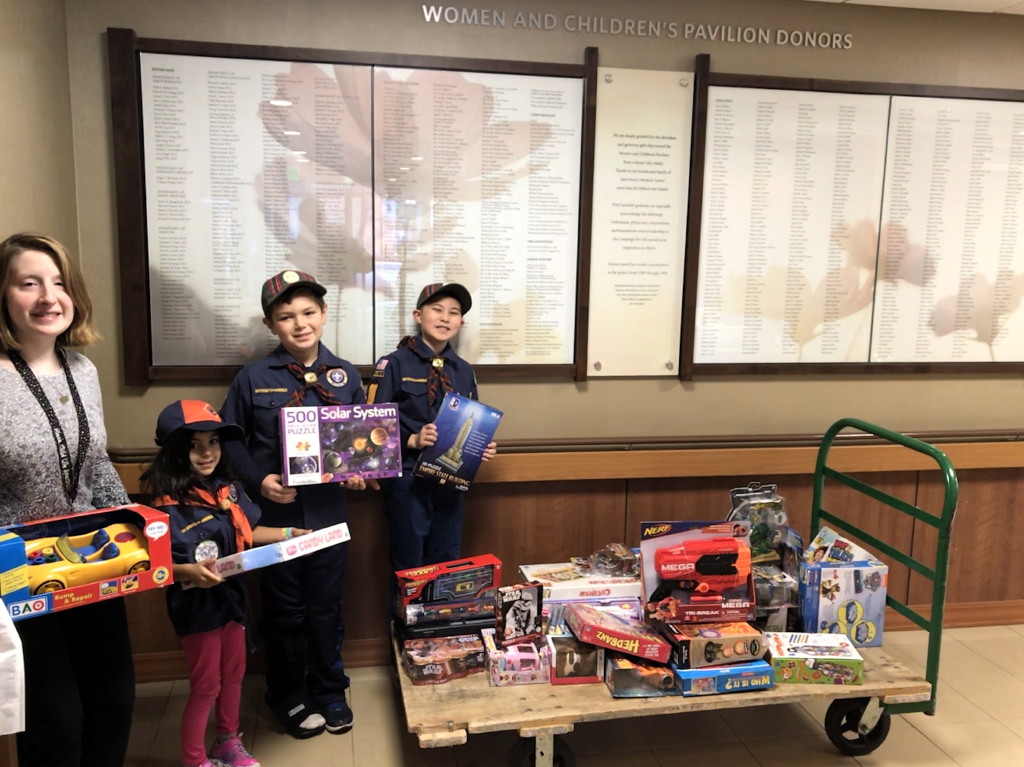 Cub Scout Pack 223 donates toys to Saint Peter’s