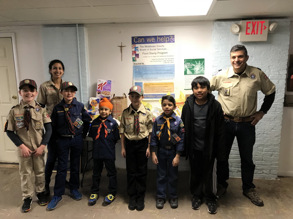 Cub Scout Pack 223 holds food drive for area church