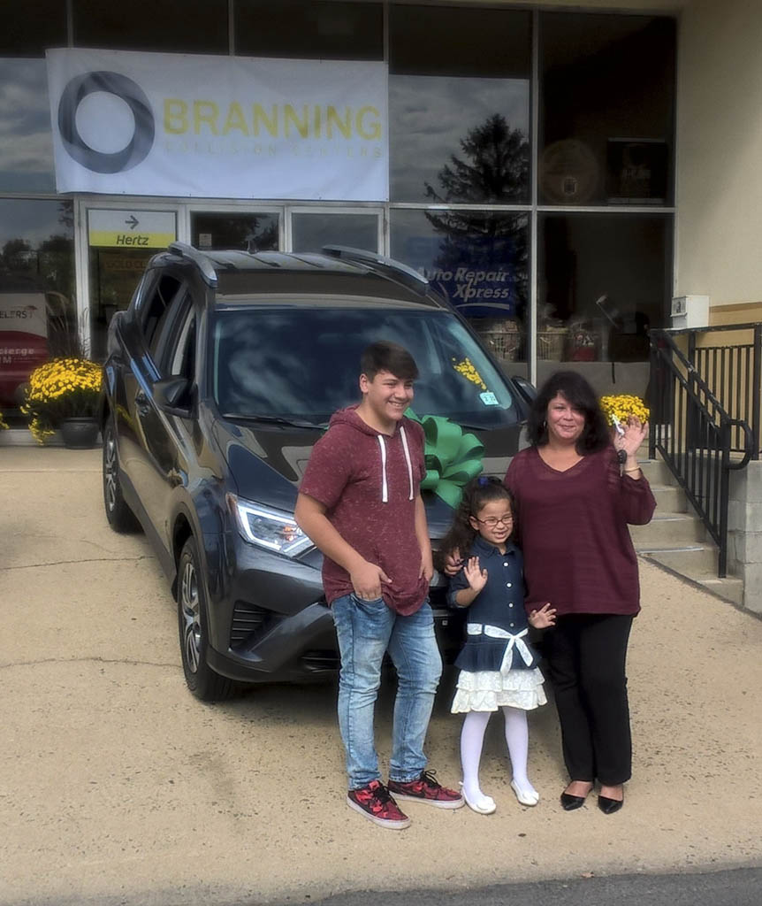 East Brunswick family receives donation of new SUV