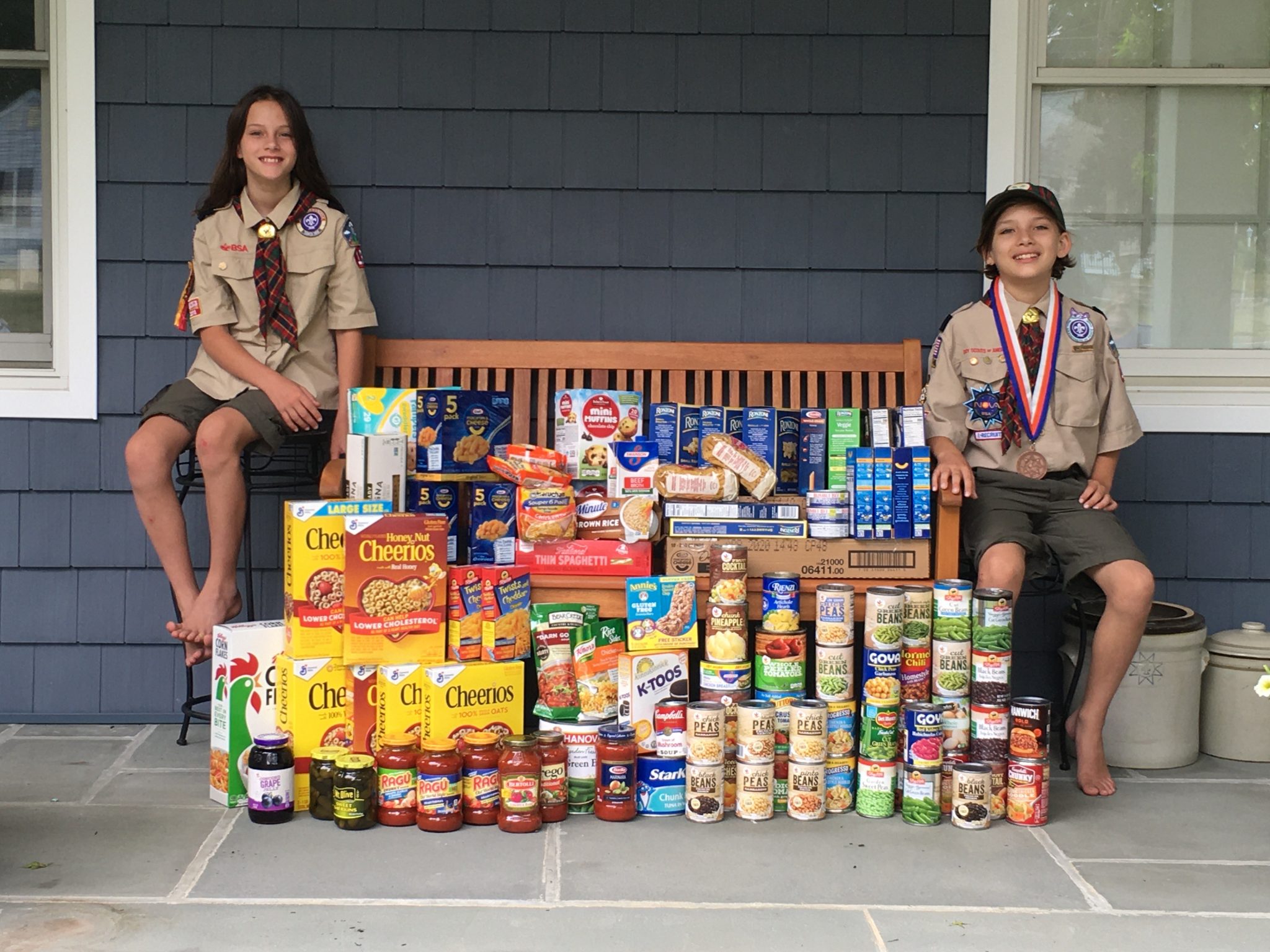 Youngsters of Cub Scout Pack 132 collect 20 crates of food for Aldersgate center, Monmouth Council CARES