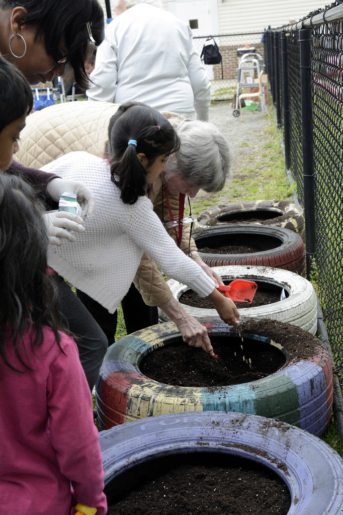 Preschoolers, seniors join together on gardening project