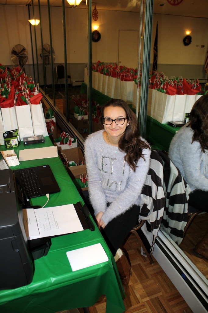 Girl Scout holds holiday party for members of area rest homes