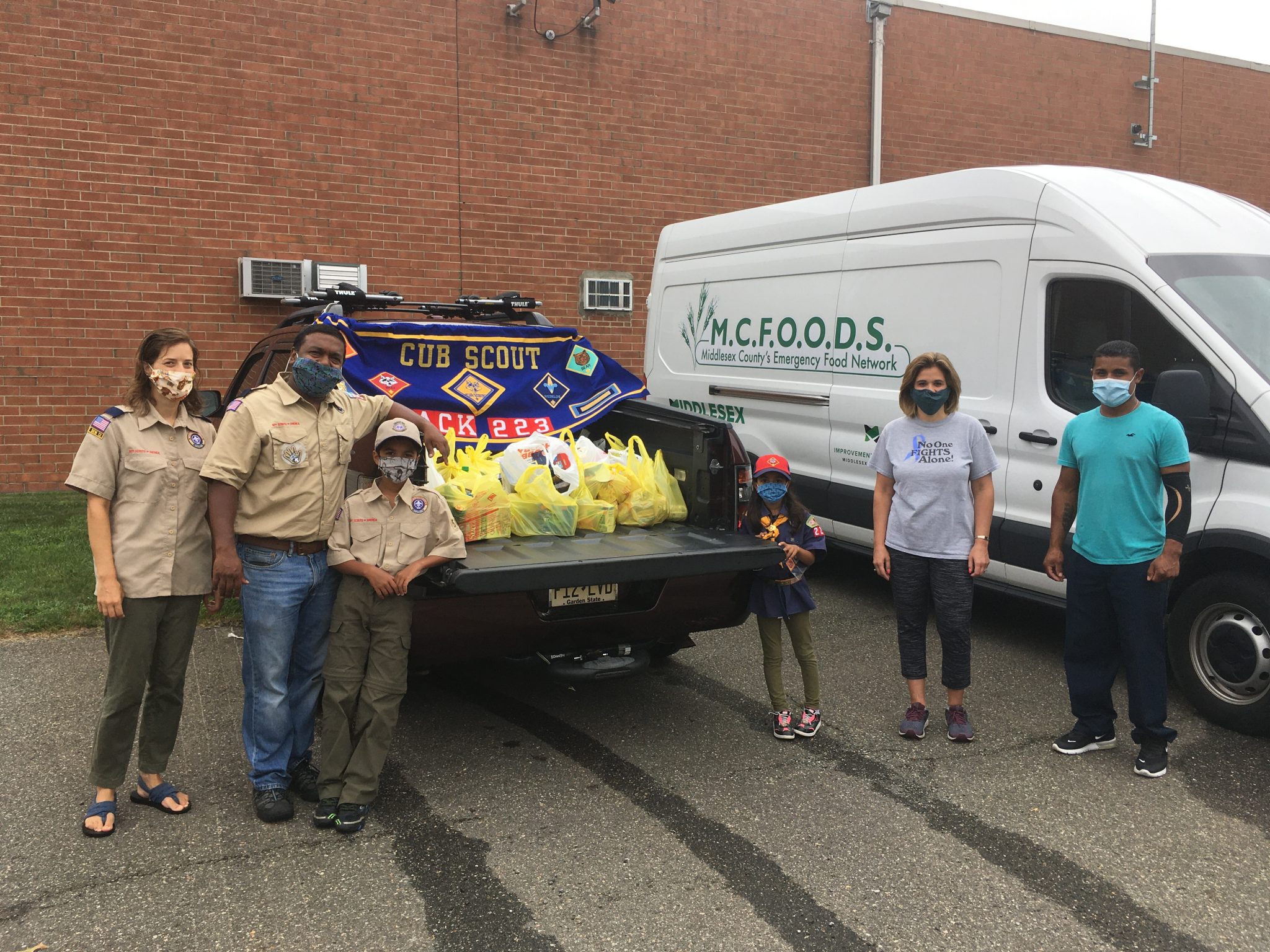 Boy Scout assists with Scouting-for-Food Project in East Brunswick