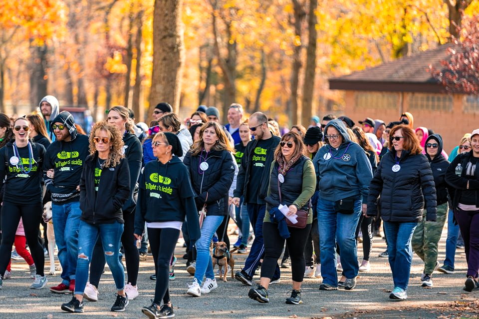 Locals walk in Thompson Park to spread awareness about suicide prevention