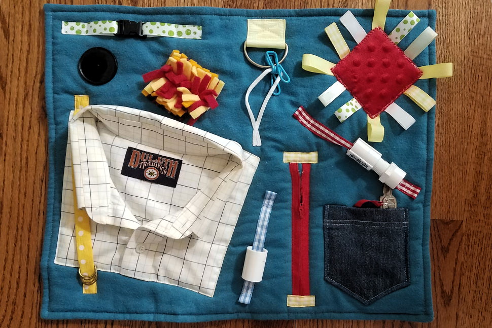 Monroe library collecting fidget quilts and twiddle muffs