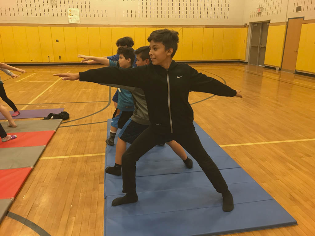 Monroe fifth graders lead classmates in yoga and mindfulness