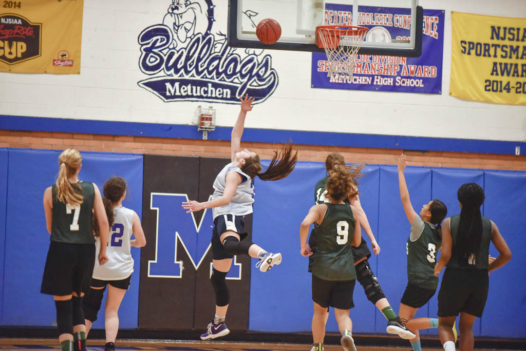 Metuchen girls’ basketball team welcomes back veteran coach