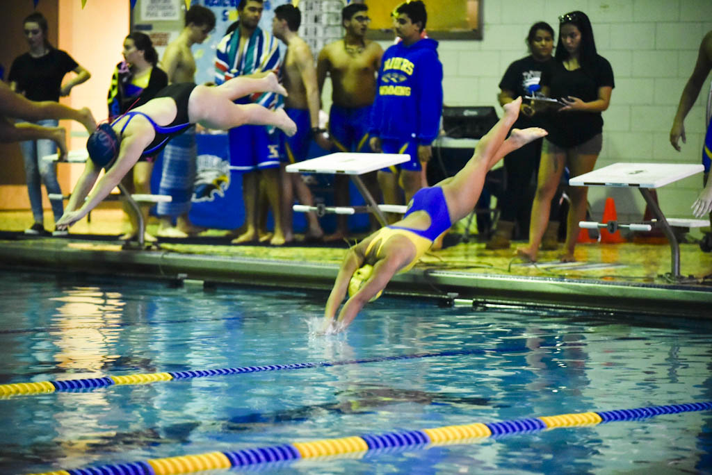 North Brunswick honors former swim coach, then sweeps Sayreville